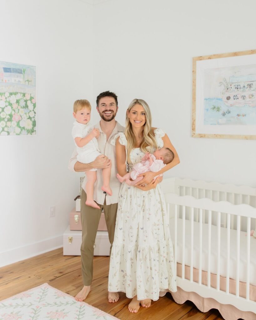 Family of four during an in-home lifestyle newborn session in Santa Rosa Beach Florida