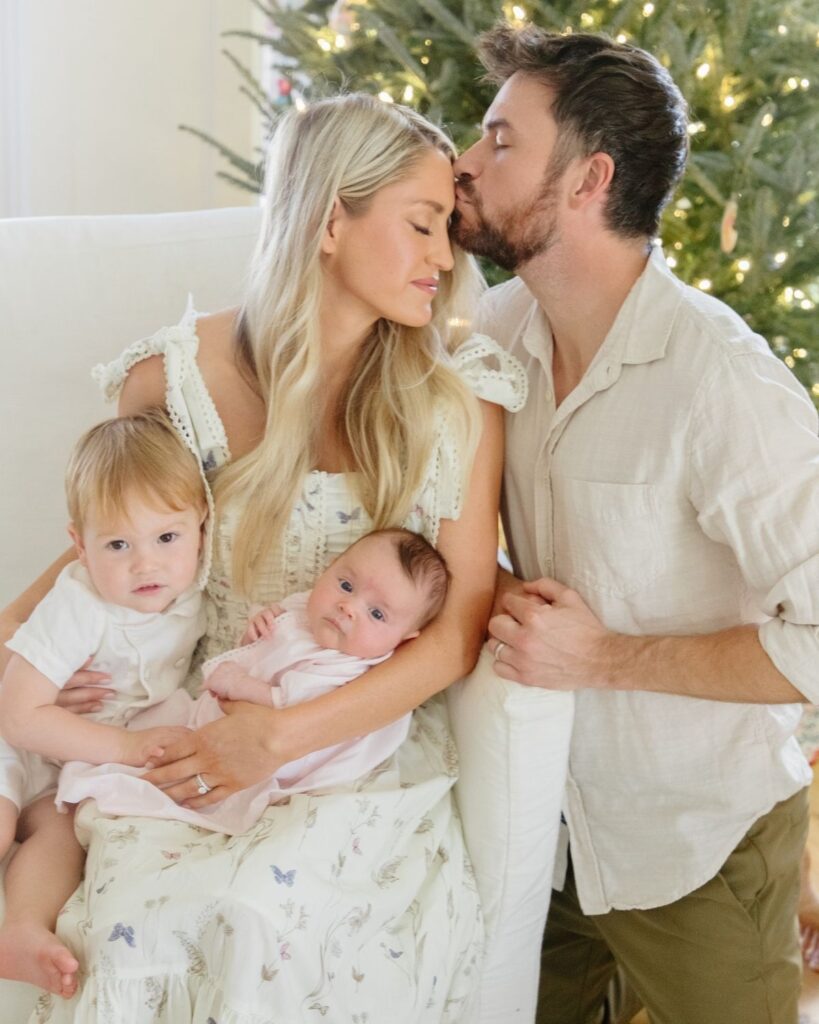 Family of four during an in-home lifestyle newborn session in Santa Rosa Beach Florida